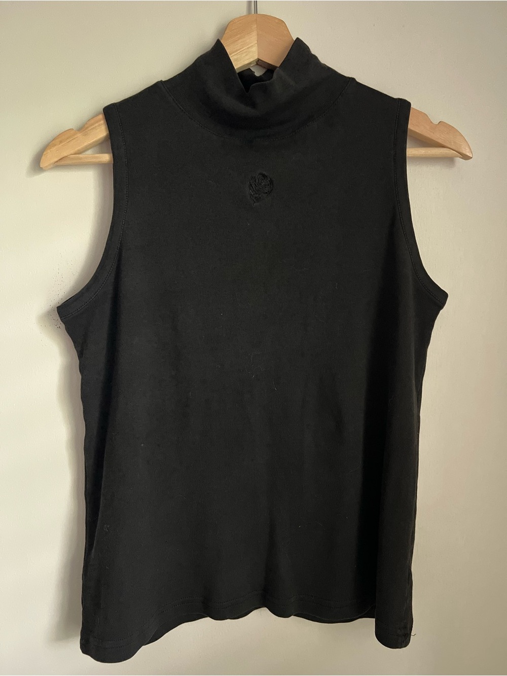 Sleeveless Black Mock Neck Top with Embroidered Floral Detail